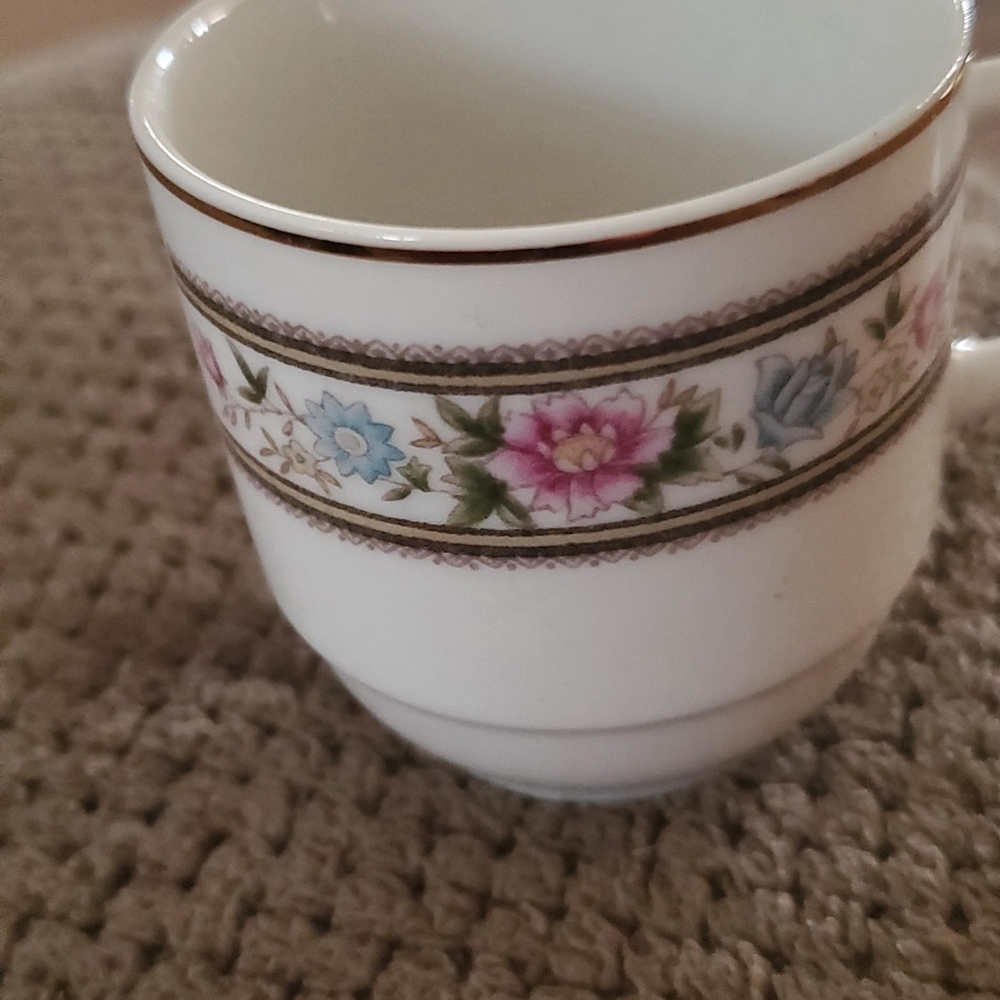 Asin miniature cup and saucer